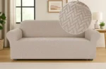 dvivietis-tamprus-sofos-uzvalkalas-su-geometriniu-rastu-smelio-kapucino-spalvos-145-185-cm