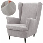 uzvalkalas-foteliui-su-aukstu-atlosu-lapu-rasto