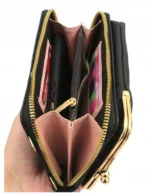 mini-rankine-telefonui-su-pinigine-juoda