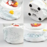 sniego-rutulys-su-snoopy-ir-woodstock-stiklinis-dovanu-dezuteje